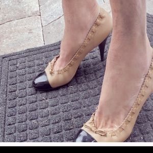 Chanel classic two tone pumps. Dress up or down